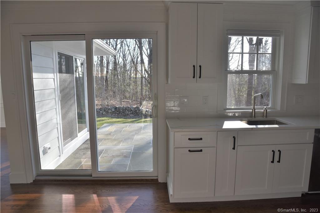 32 Deer Hill Road Redding, CT 06896 - Photo 7 of 23 Kitchen w/ sliders to deck