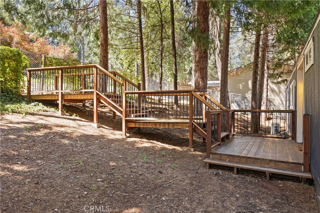 14742 Colter Way Magalia, CA 95954 - Photo 4 of 19 a view of outdoor space with deck and a yard