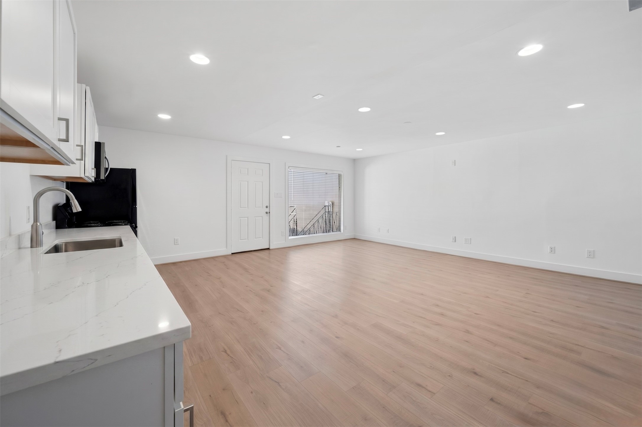 234 Westheimer Road, Unit 4 Houston, TX 77006 - Photo 15 of 16 Open Floor Plan with New Kitchen & Quartz Countertops