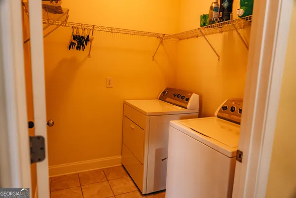 a utility room with a washer and dryer