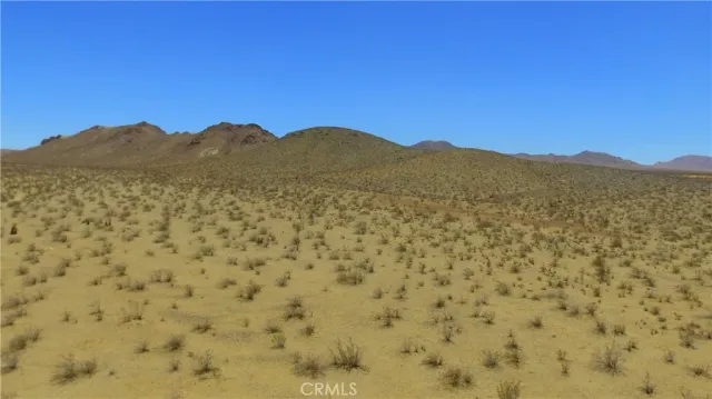 a view of lake and mountain