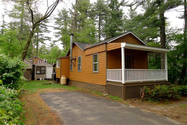 10 Spruce Road Groton, MA 01450 - Photo 5 of 17 a view of a house with a yard