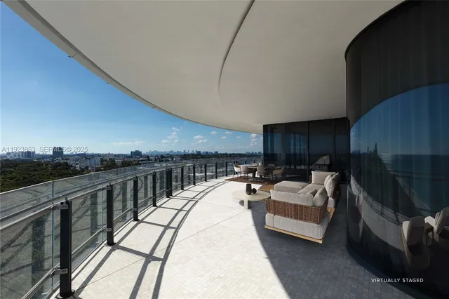 a view of a couches on the roof deck