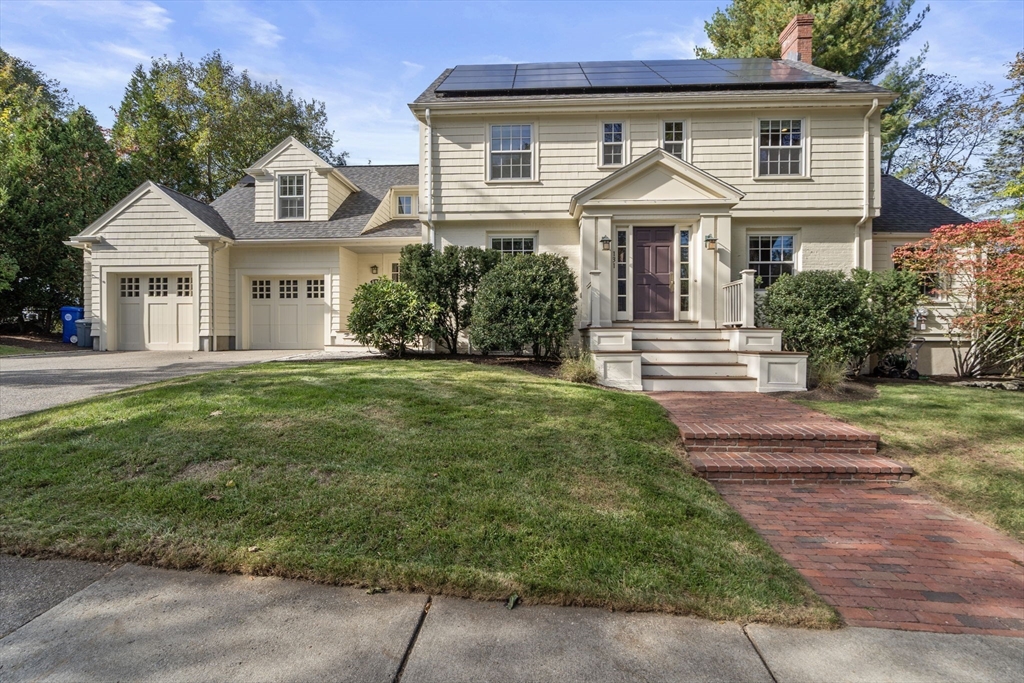 131 Oliver Road Newton, MA 02468 - Photo 1 of 33 a front view of a house with a yard