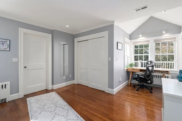 a view of livingroom with furniture and workspace