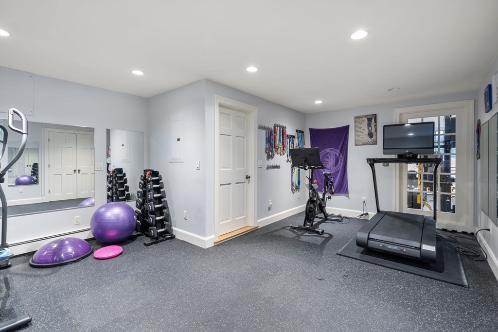 131 Oliver Road Newton, MA 02468 - Photo 28 of 33 a view of a room with gym equipment