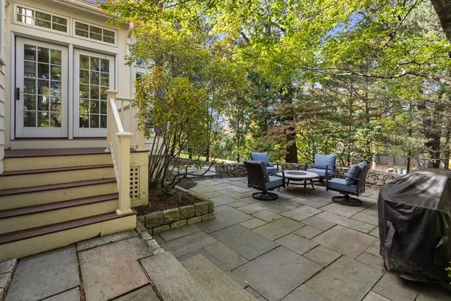a view of a backyard with sitting area and sitting area