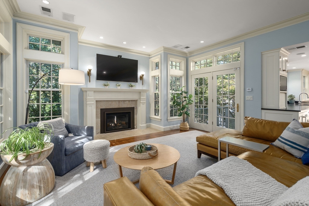 131 Oliver Road Newton, MA 02468 - Photo 4 of 33 a living room with furniture fireplace and window