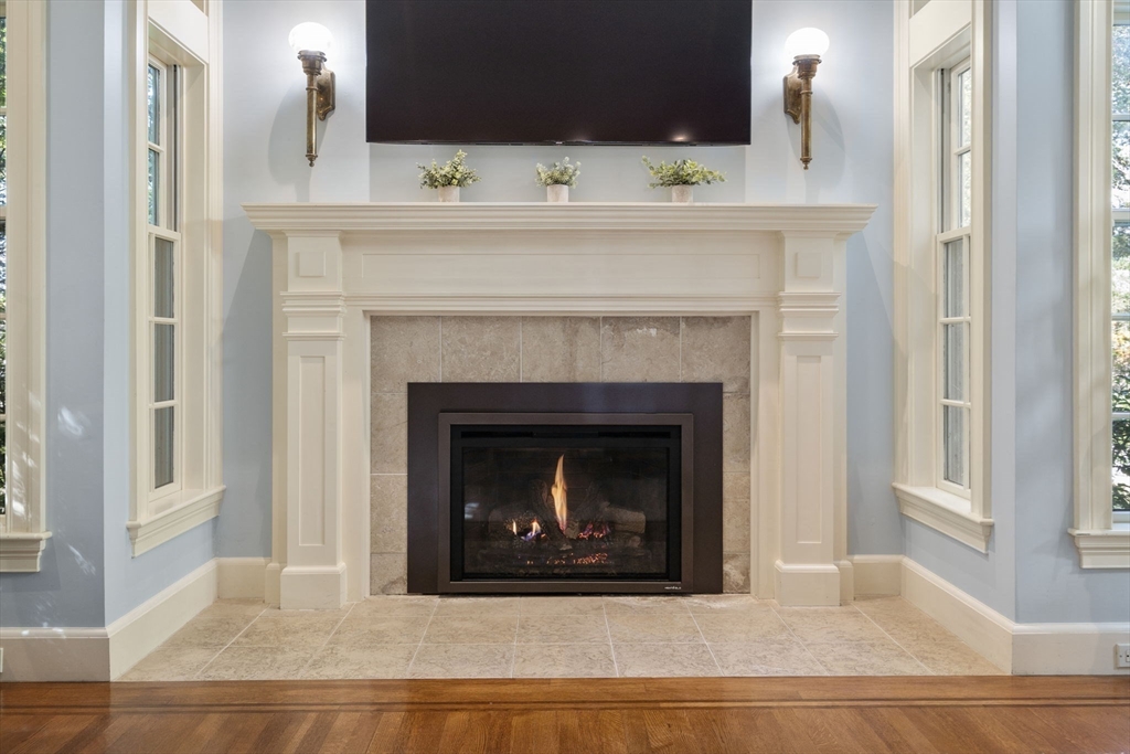 131 Oliver Road Newton, MA 02468 - Photo 6 of 33 a living room with a fireplace