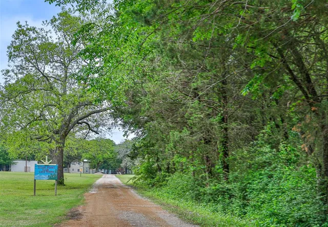a view of an swimming pool and a yard
