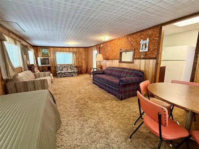 a bedroom with furniture and window