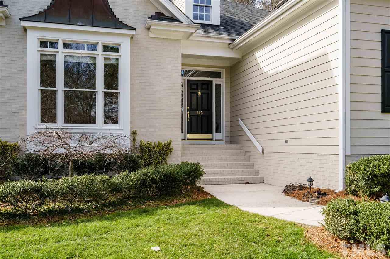 412 Chatterson Drive Raleigh, NC 27615 - Photo 3 of 30 This inviting Entry Portico will shield your guests from the elements.