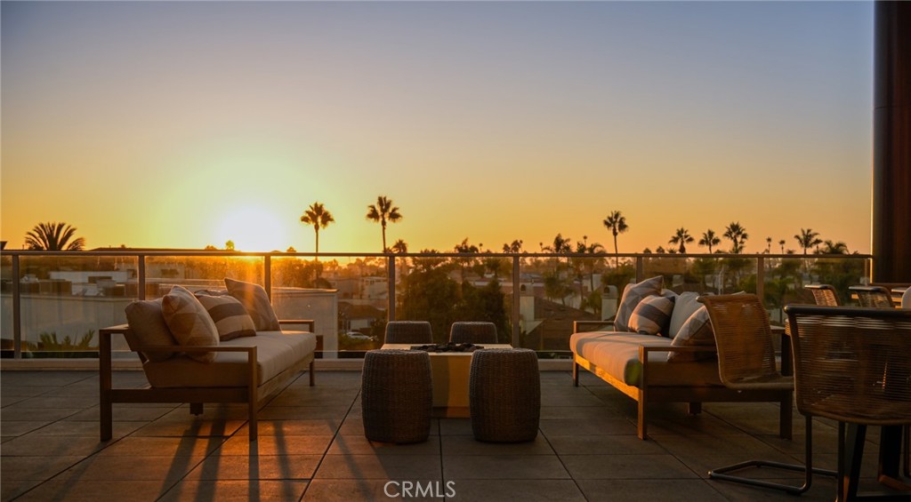 414 Main Street, Unit 330 Huntington Beach, CA 92648 - Photo 23 of 42 a view of a terrace with furniture