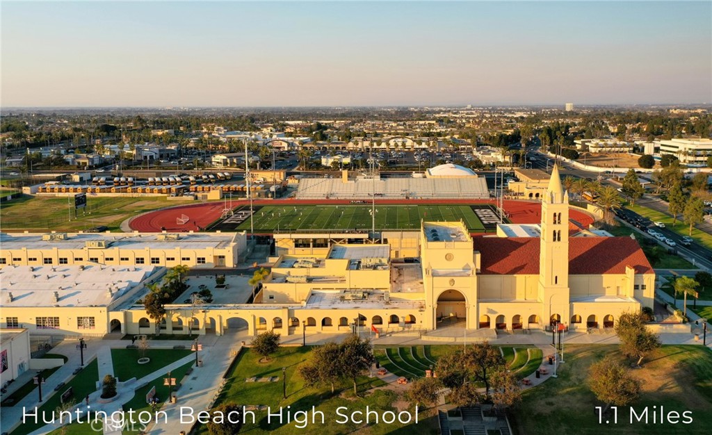 414 Main Street, Unit 330 Huntington Beach, CA 92648 - Photo 34 of 42 an aerial view of residential building and lake