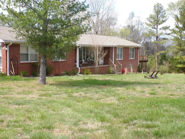 a front view of a house with yard
