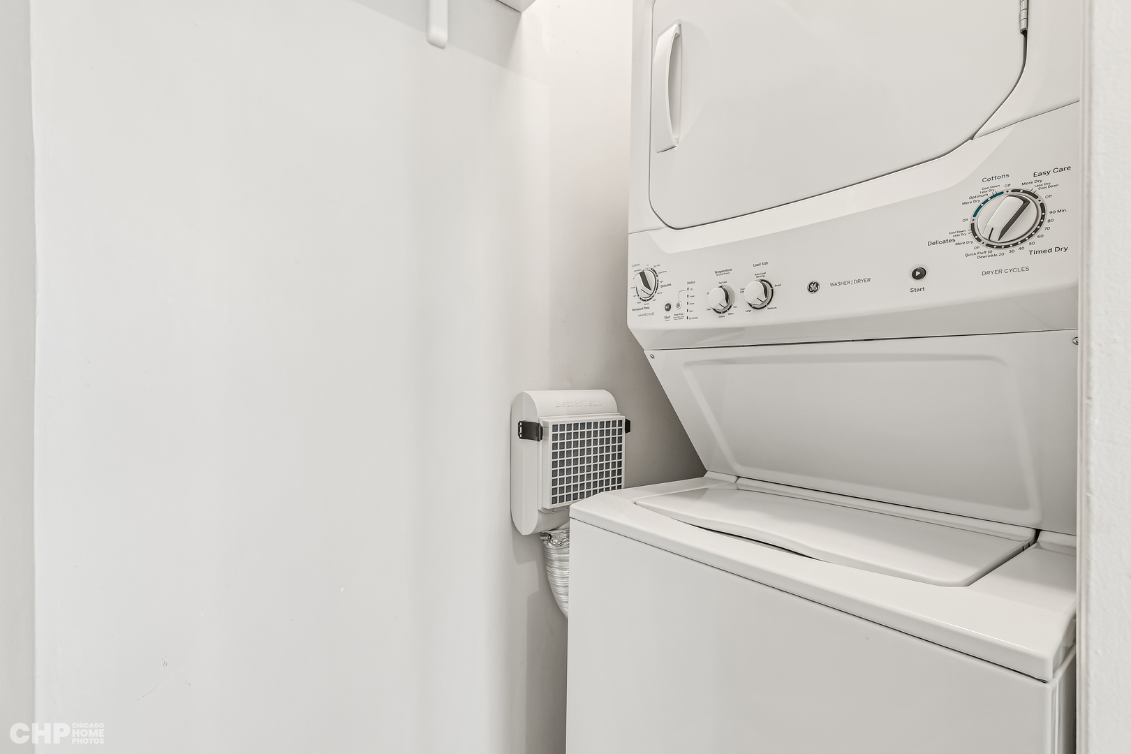 111 East Chestnut Street, Unit 49H Chicago, IL 60611 - Photo 22 of 27 a utility room with dryer and washer