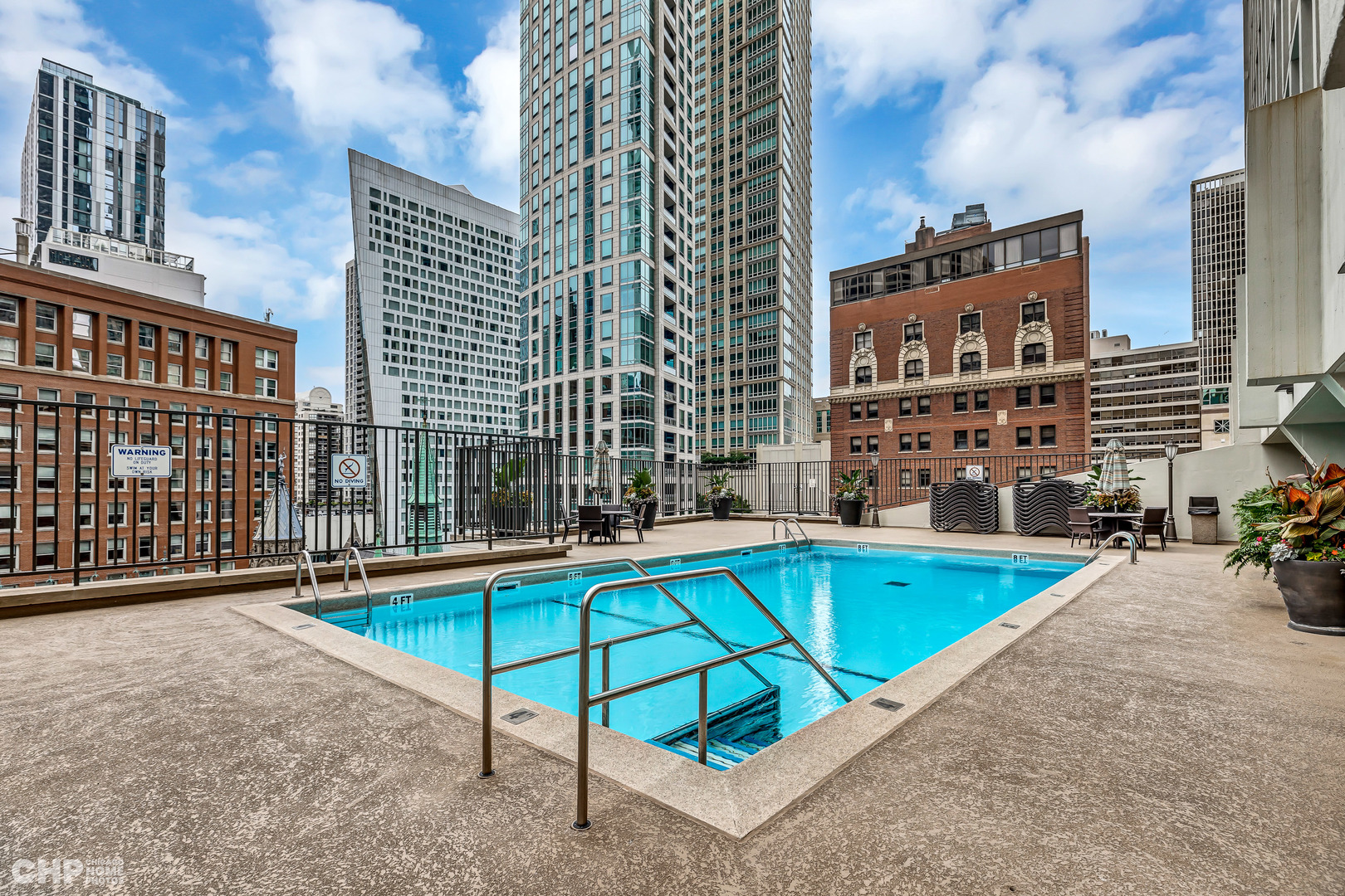 111 East Chestnut Street, Unit 49H Chicago, IL 60611 - Photo 25 of 27 a view of swimming pool with outdoor seating