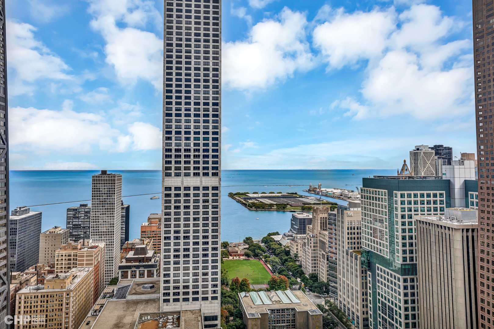 111 East Chestnut Street, Unit 49H Chicago, IL 60611 - Photo 9 of 27 a city view with tall buildings