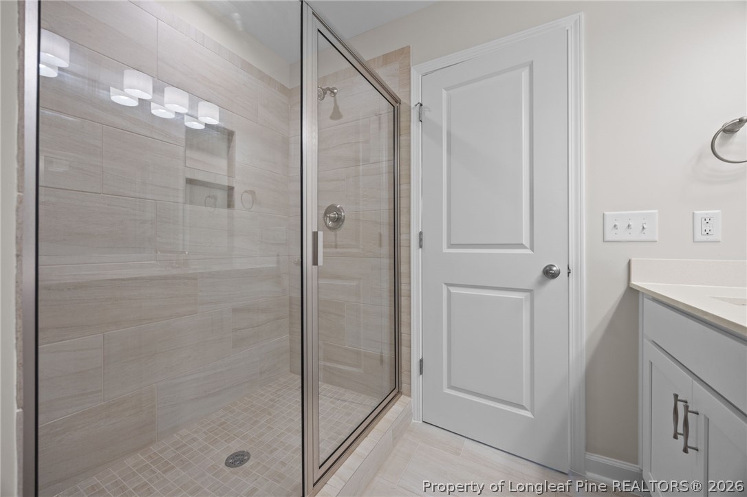 232 Elijah Way, Unit 8 Vass, NC 28394 - Photo 29 of 41 a bathroom with a shower