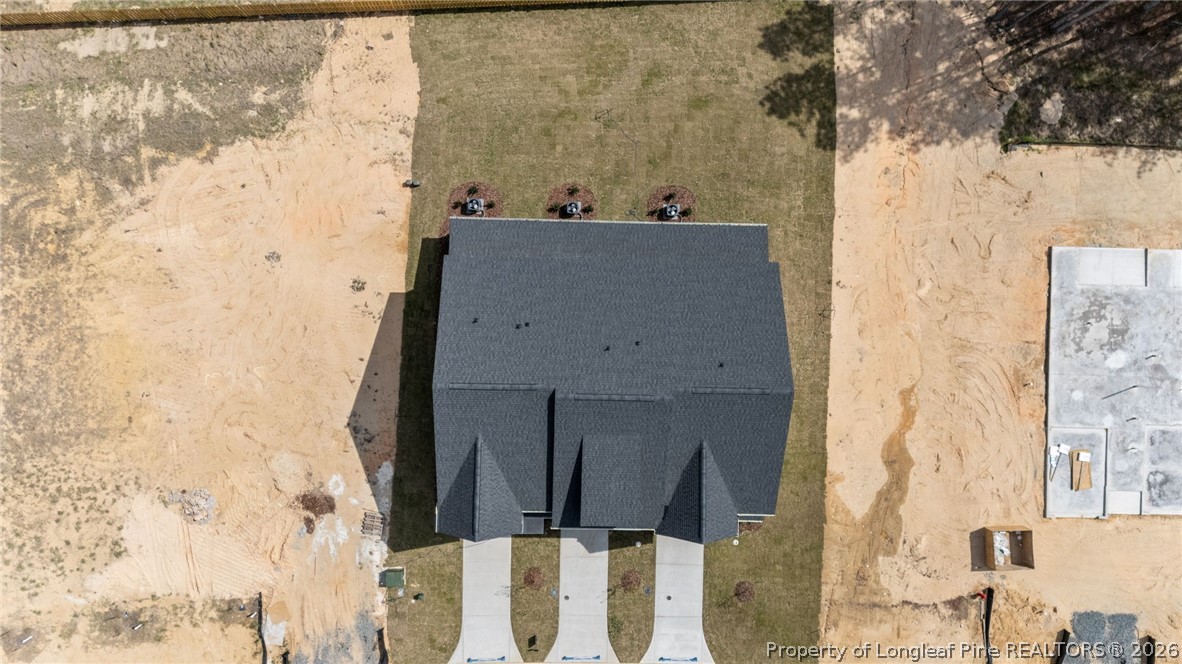 232 Elijah Way, Unit 8 Vass, NC 28394 - Photo 38 of 41 a bathroom with a bathtub and shower
