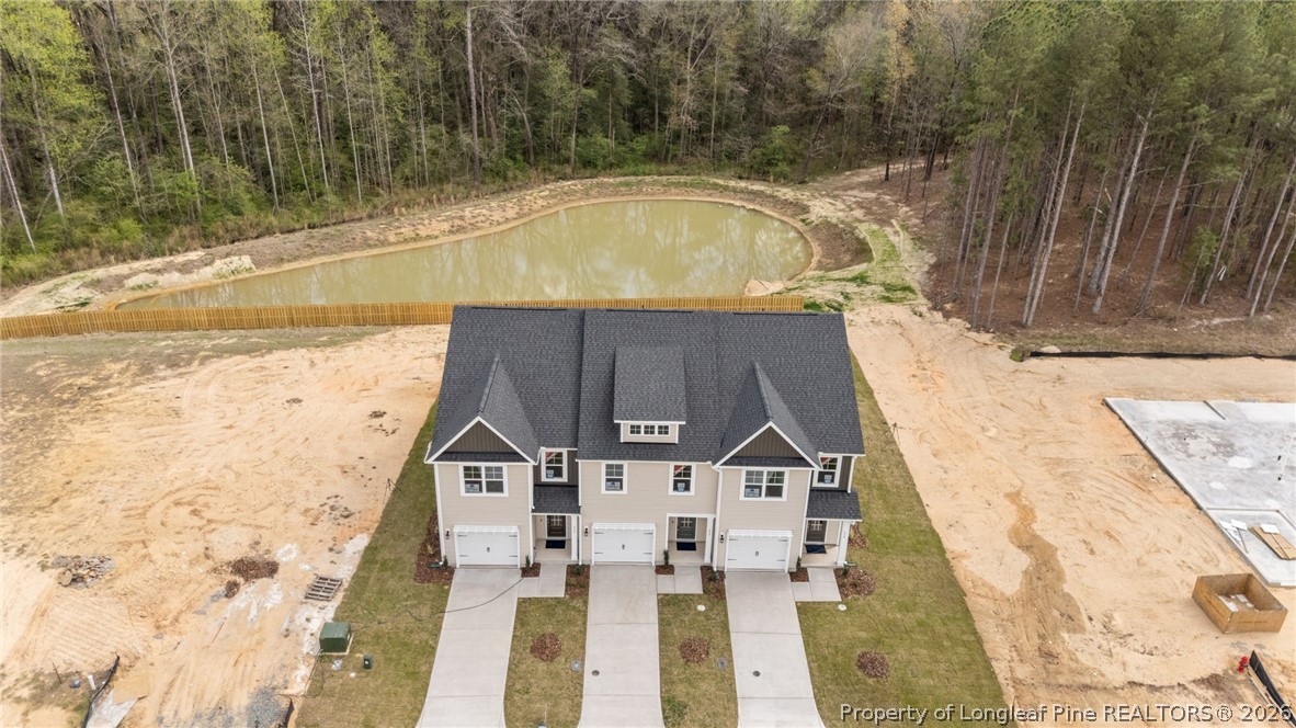 232 Elijah Way, Unit 8 Vass, NC 28394 - Photo 39 of 41 a aerial view of a house with a yard