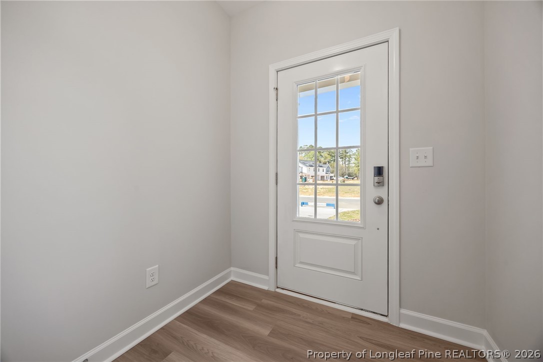 232 Elijah Way, Unit 8 Vass, NC 28394 - Photo 5 of 41 an empty room with windows