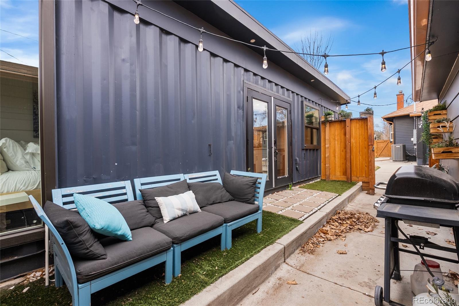 4546 Meade Street Denver, CO 80211 - Photo 22 of 35 a outdoor living space with furniture and a couch