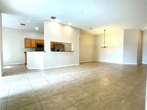 a view of a kitchen with a sink