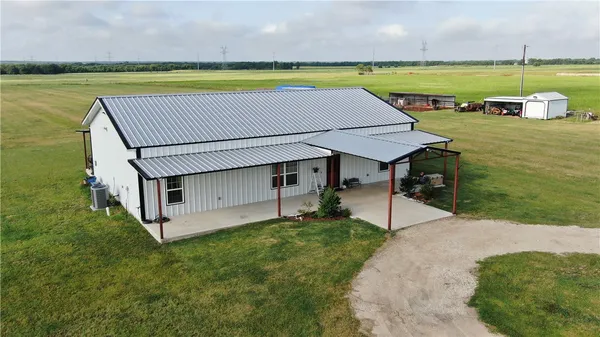 a view of a swimming pool and lounge chair