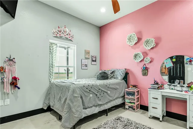 a bedroom with a bed and a bed