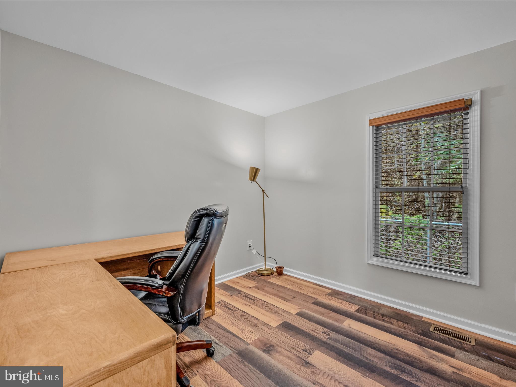 84 New Hope Road Berkeley Springs, WV 25411 - Photo 24 of 28 a view of a workspace with furniture and a window