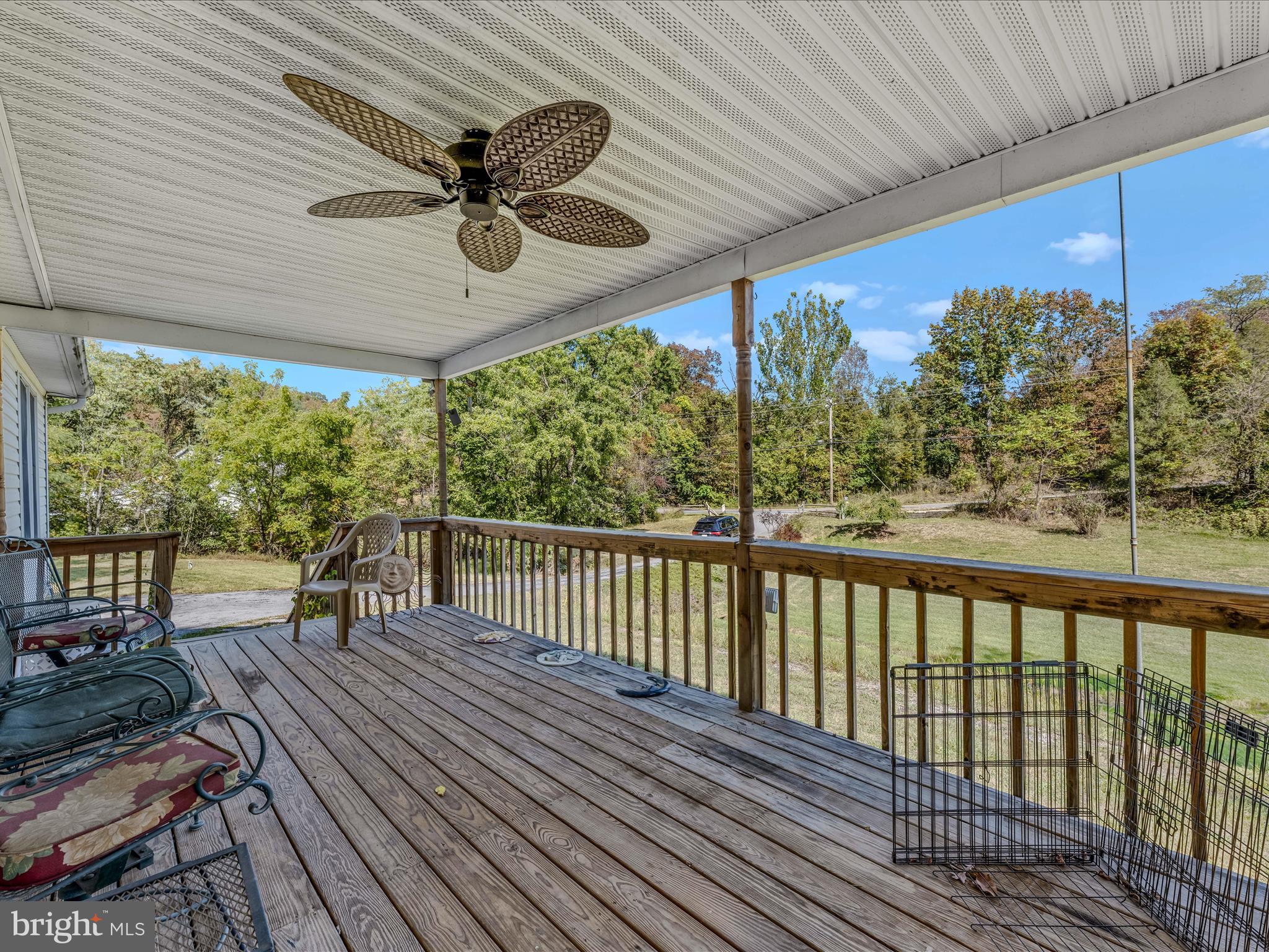 84 New Hope Road Berkeley Springs, WV 25411 - Photo 7 of 28 a view of a two chairs in the balcony