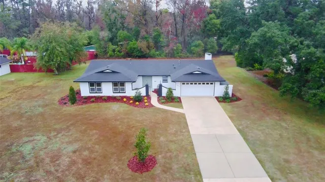 front view of a house with a yard