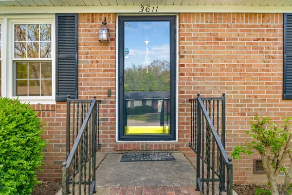 a view of a door with a potted plant