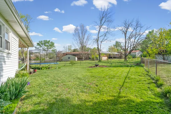 front view of a house with a big yard