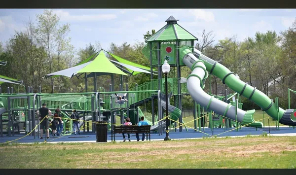 a view of a park with a slide