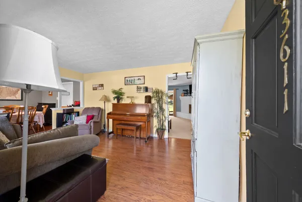 a living room with furniture and a table