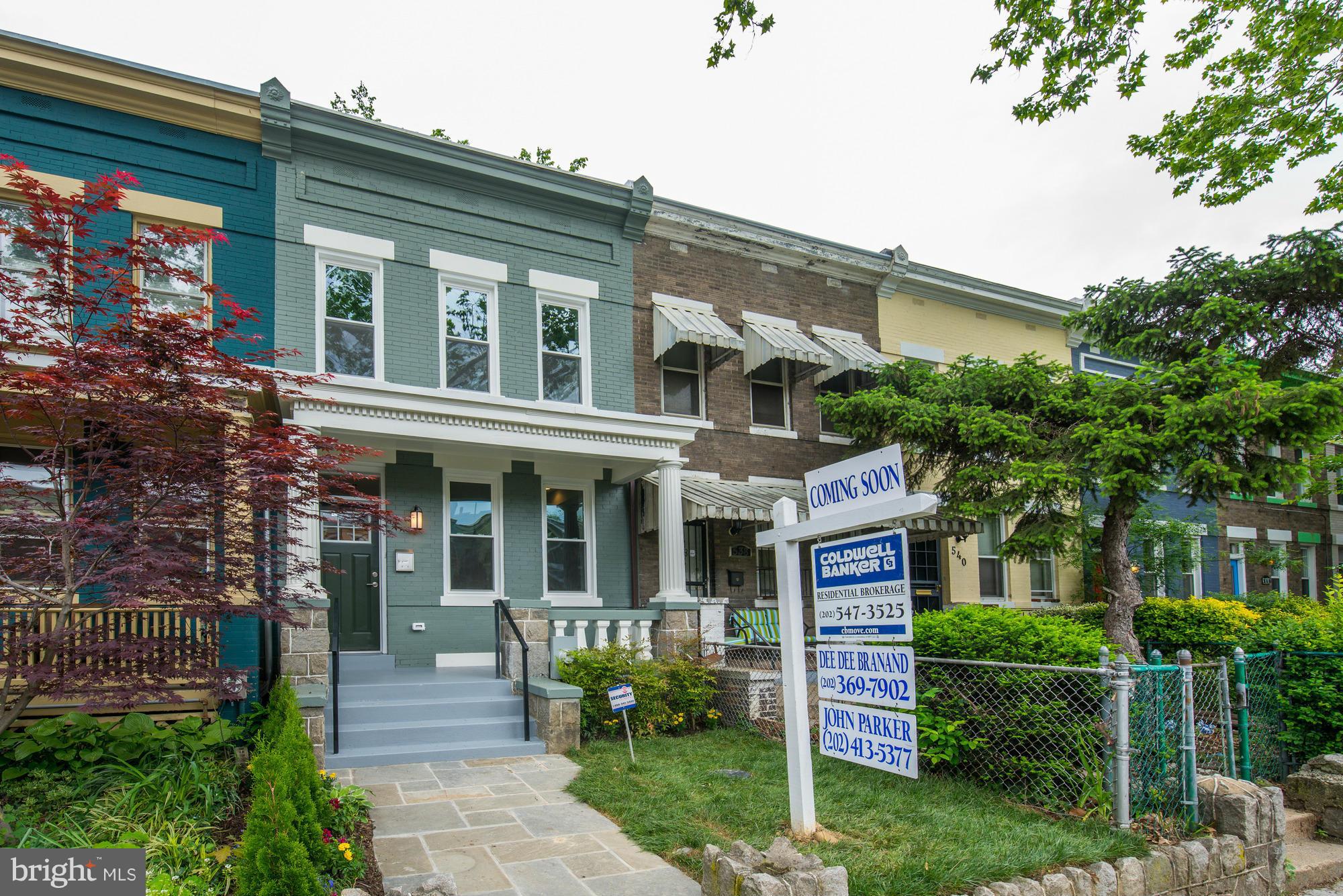536 14th Street Southeast Washington, DC 20003 - Photo 2 of 25 a front view of a house with a yard and potted plants