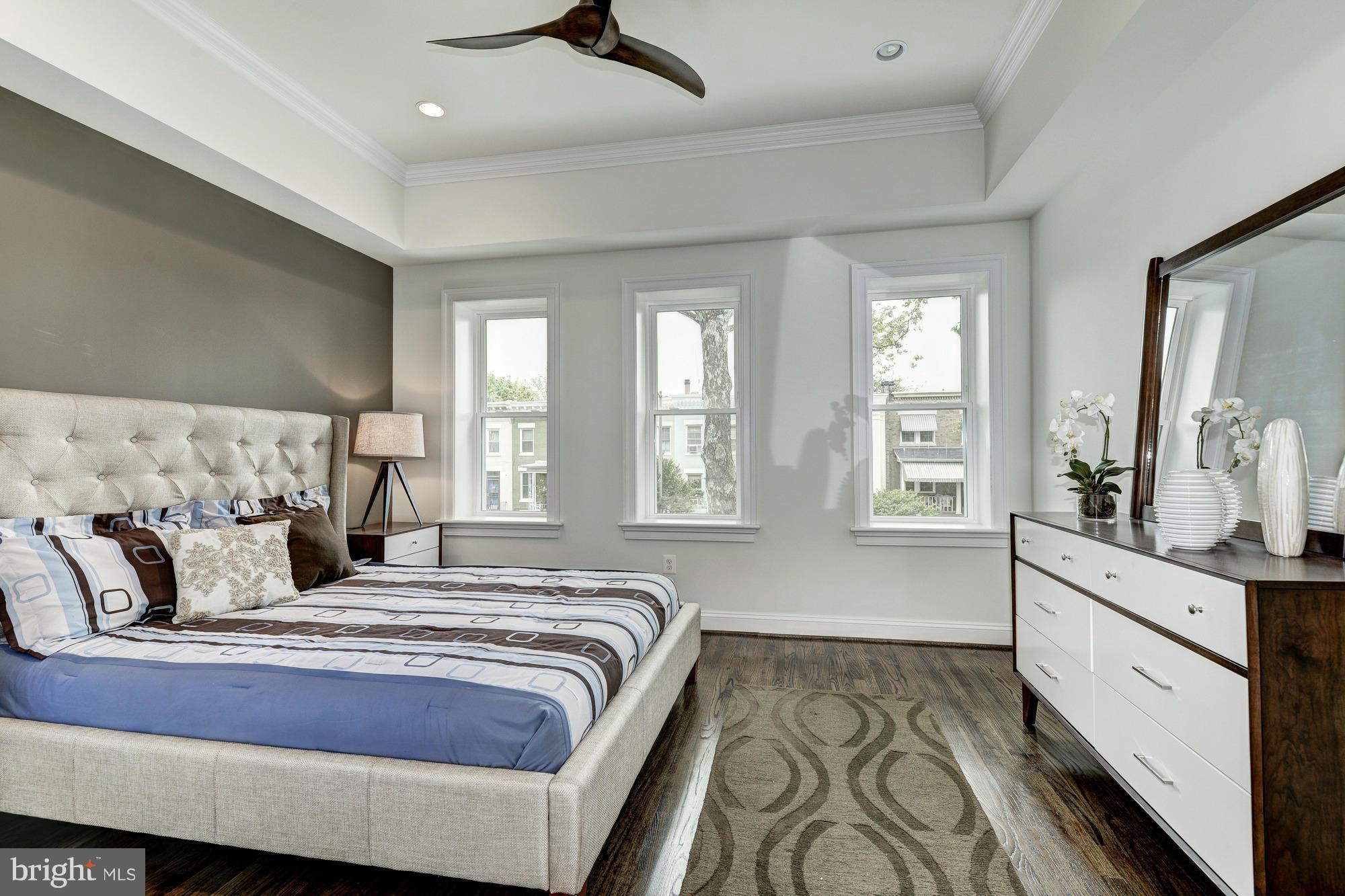 536 14th Street Southeast Washington, DC 20003 - Photo 16 of 25 a bed room with bed and window