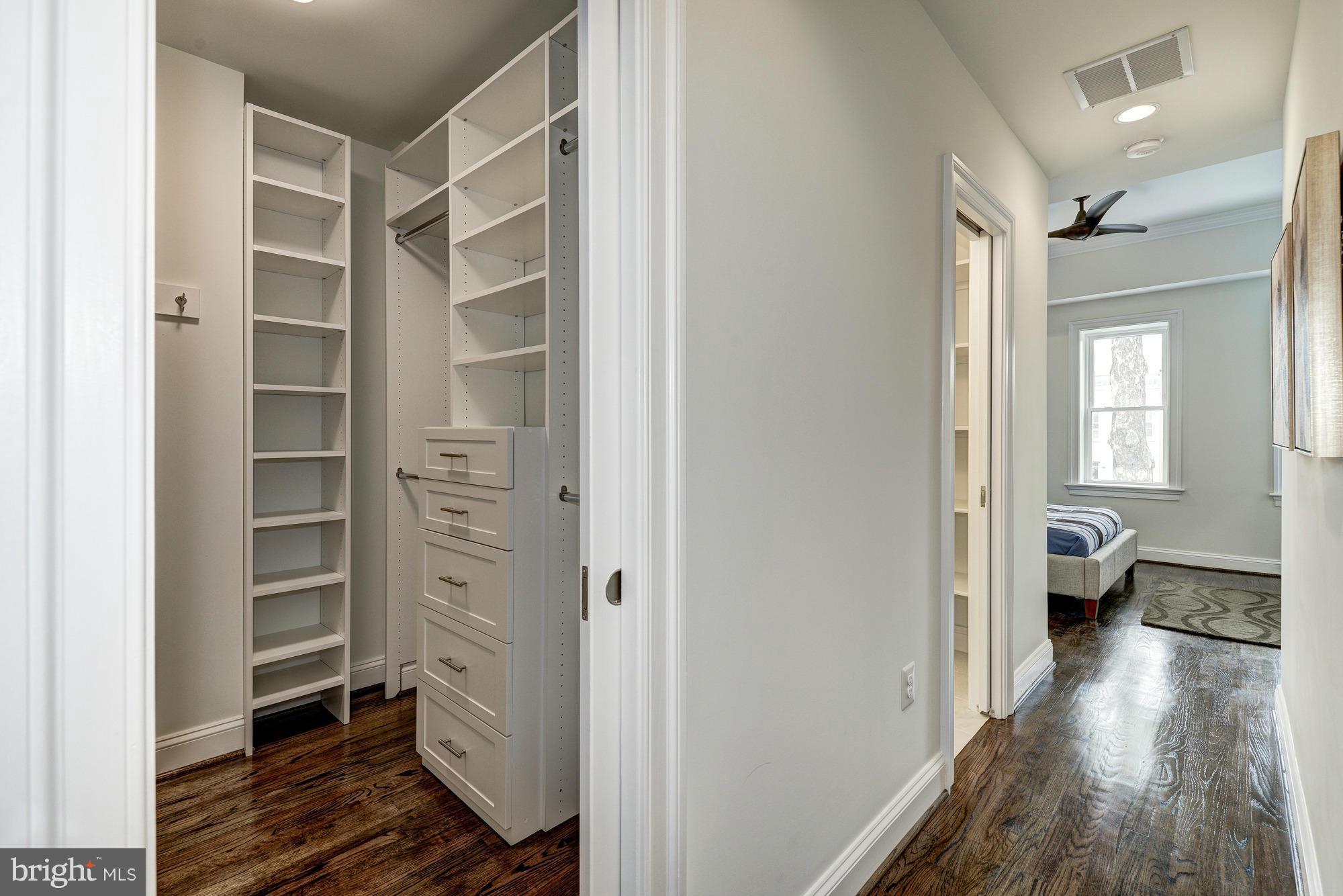 536 14th Street Southeast Washington, DC 20003 - Photo 19 of 25 a view of a hallway with wooden floor and a bedroom