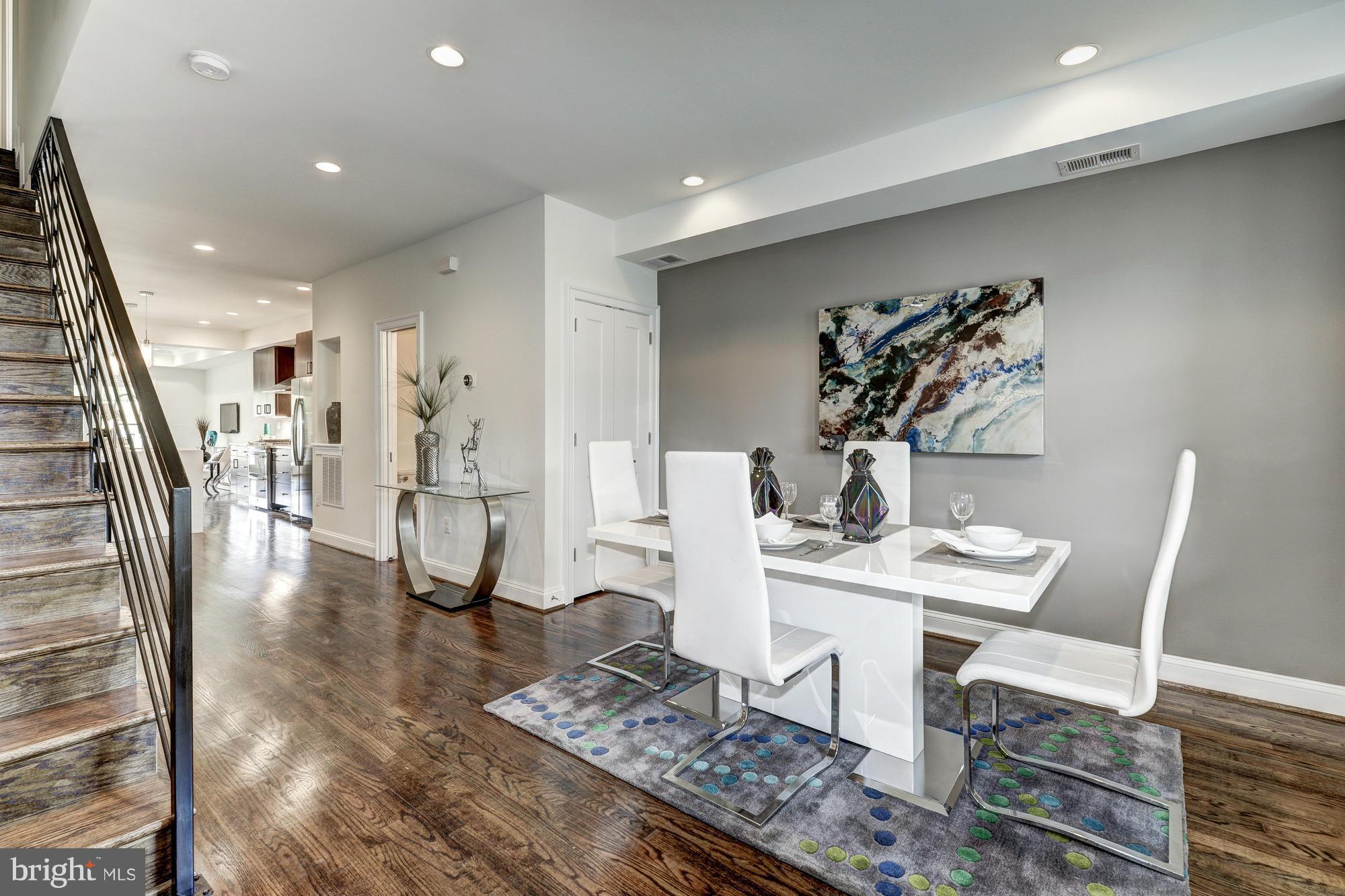 536 14th Street Southeast Washington, DC 20003 - Photo 3 of 25 a living room with furniture and wooden floor