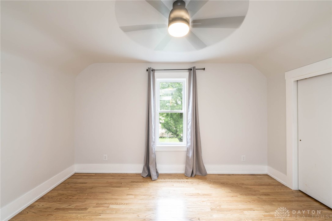 190 Swailes Road Troy, OH 45373 - Photo 33 of 82 This airy bedroom features gleaming hardwood floors and ample natural light, perfect for peaceful living.