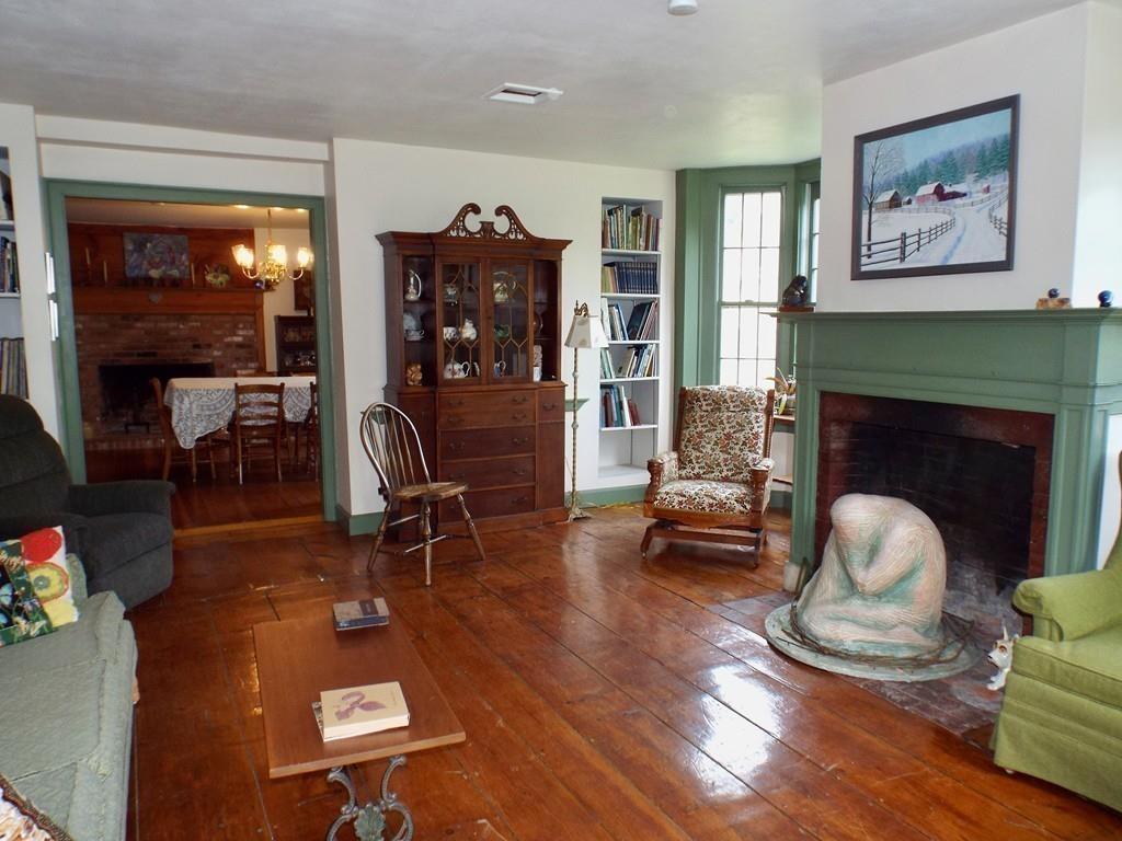 2 Charlemont Road Buckland, MA 01338 - Photo 16 of 42 a living room with furniture and a fireplace