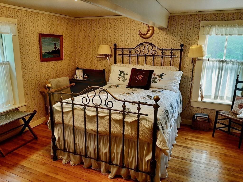 2 Charlemont Road Buckland, MA 01338 - Photo 30 of 42 a bed sitting in a bedroom next to a window