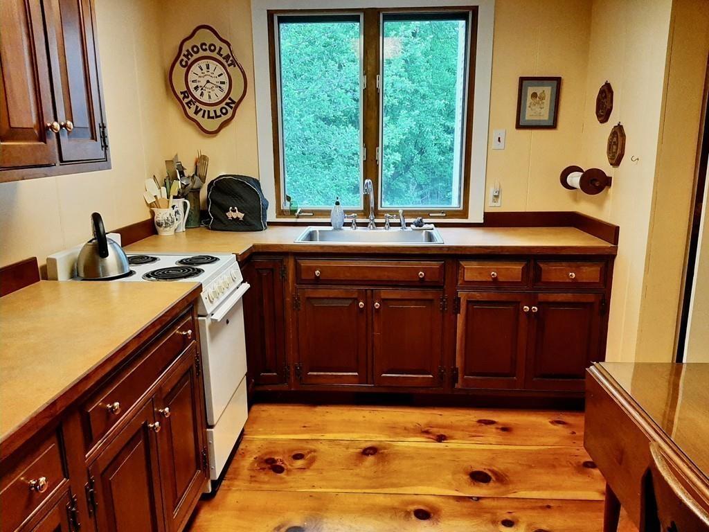 2 Charlemont Road Buckland, MA 01338 - Photo 34 of 42 a kitchen with a sink and a stove top oven
