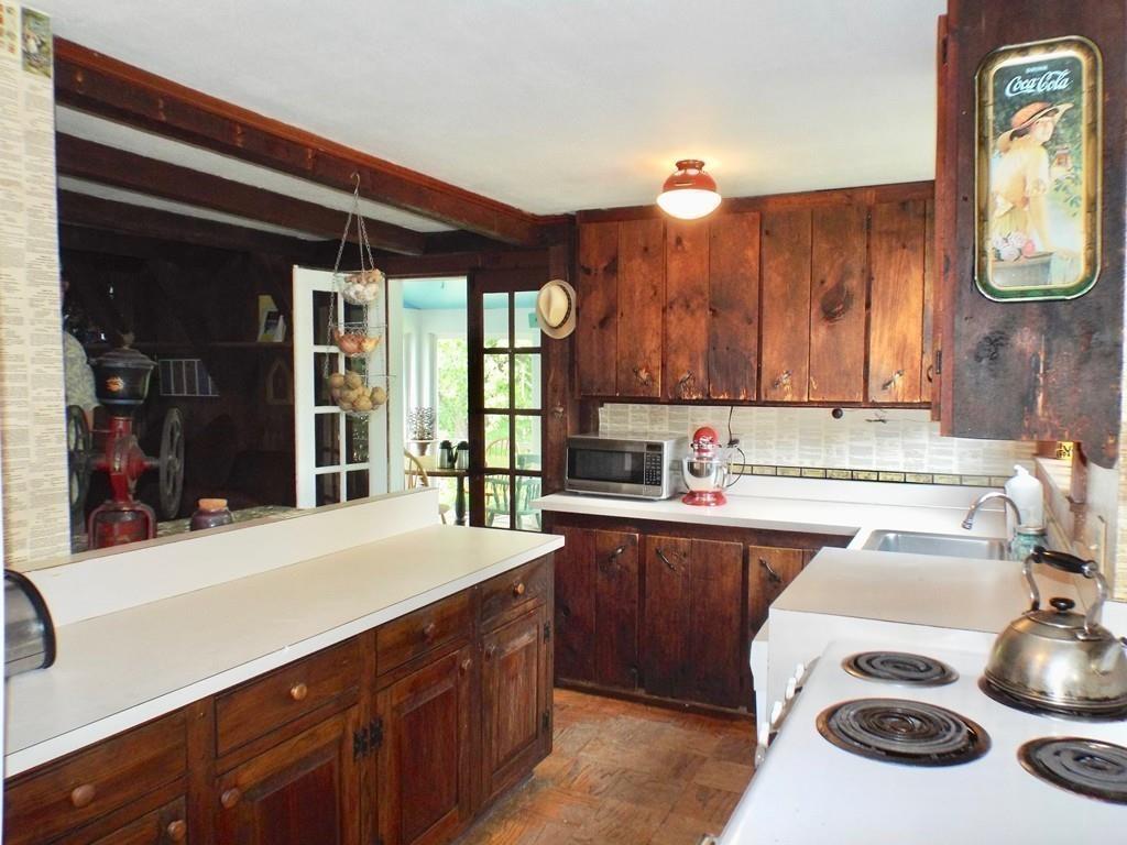 2 Charlemont Road Buckland, MA 01338 - Photo 10 of 42 a kitchen with a stove and cabinets
