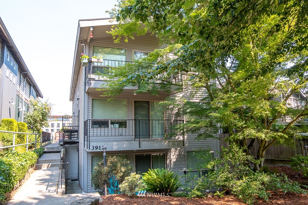 3912 Linden Avenue North Seattle, WA 98103 - Photo 2 of 11 a front view of a house with garden