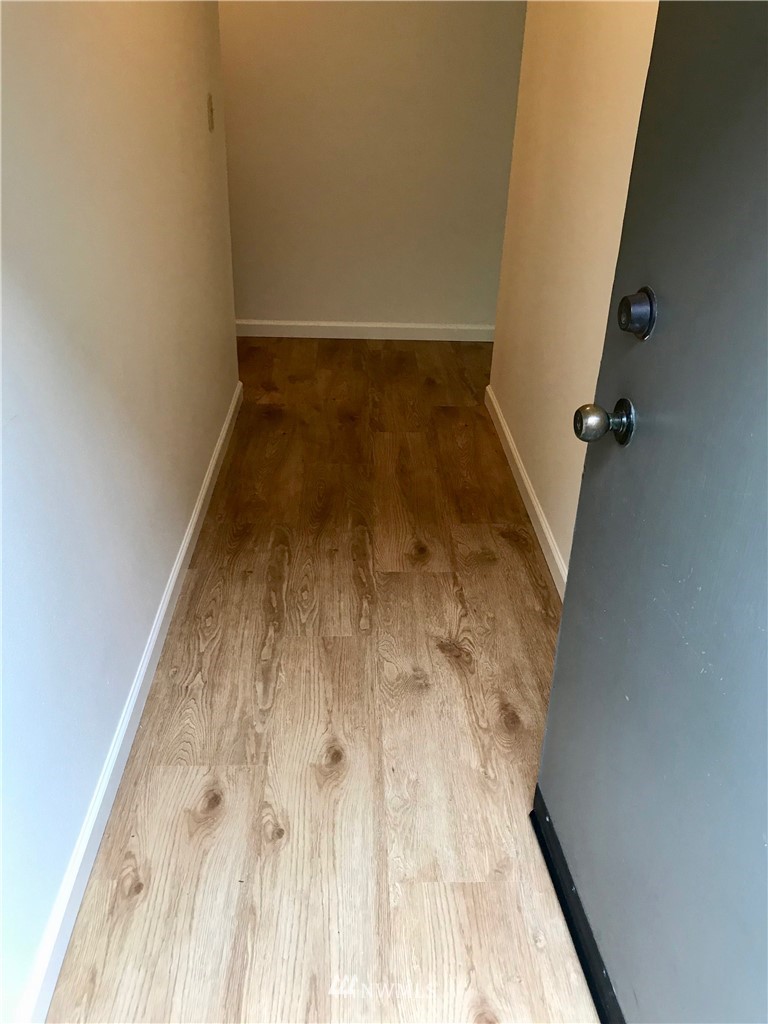 3912 Linden Avenue North Seattle, WA 98103 - Photo 4 of 11 wooden floor in a bathroom