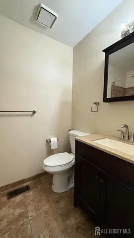 a bathroom with a sink and a toilet