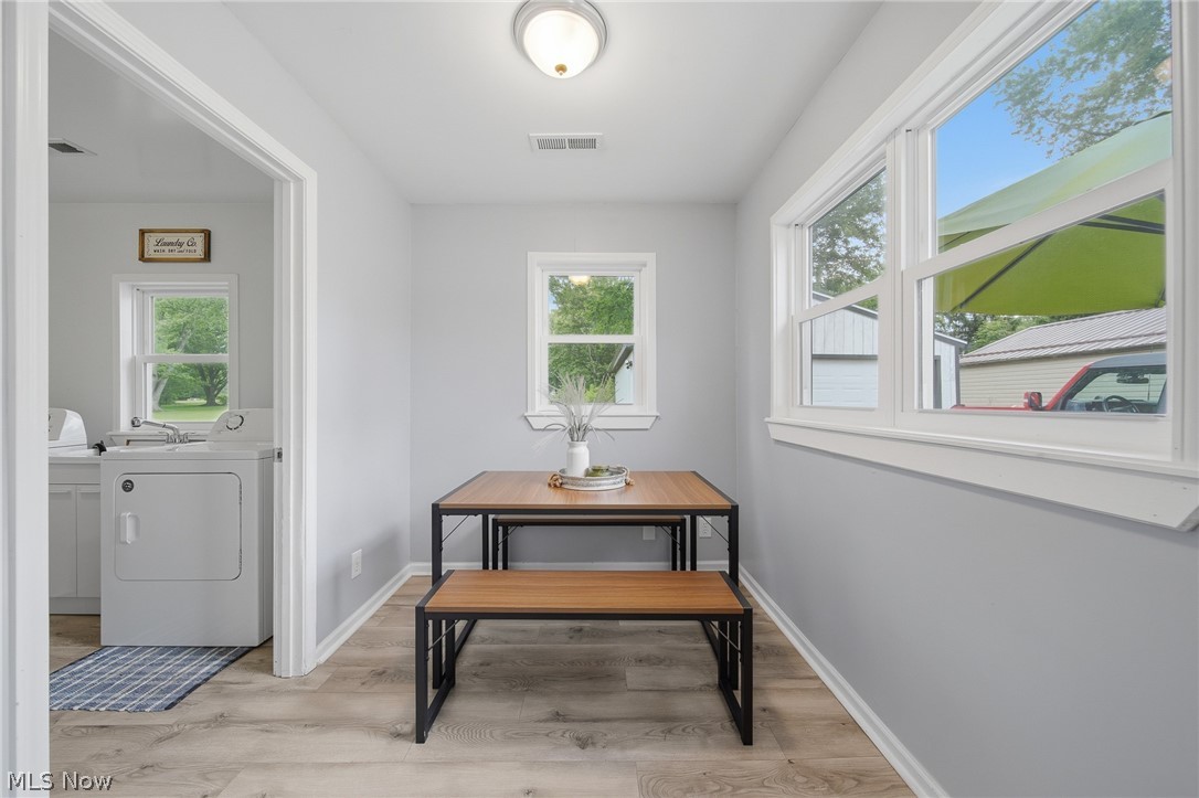 3471 State Rte 5 Newton Falls, OH 44444 - Photo 11 of 31 Dining space featuring wood-finish flooring, light grey walls, and a recessed ceiling light